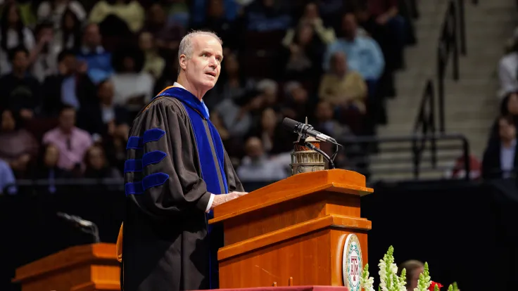 artsci graduation speaker at podium