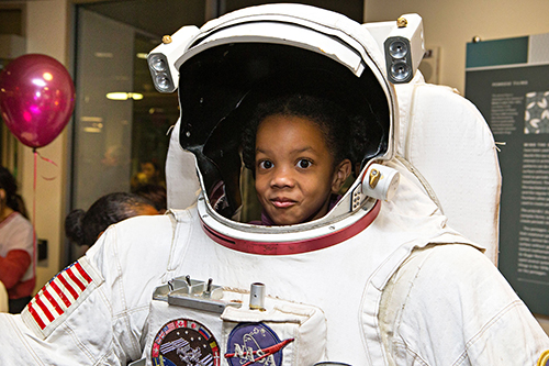 Girl in Astronaut Suit